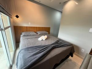 Ένα ή περισσότερα κρεβάτια σε δωμάτιο στο Apartamento 85 - Friends