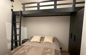 Postel nebo postele na pokoji v ubytování Ski Chalet C23 Ski-in Ski-out by Aavalevi