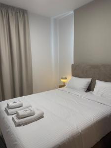 Ένα ή περισσότερα κρεβάτια σε δωμάτιο στο Kroisou Comfort Stay