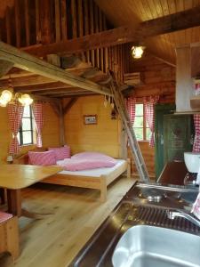 Postel nebo postele na pokoji v ubytování Eichberghütte
