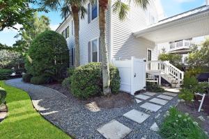 a house with a walkway next to a house at 219 Olive Way in East End