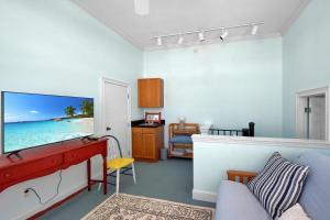 a living room with a view of the ocean at 219 Olive Way in East End