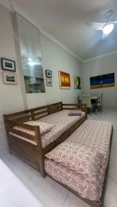 Кровать или кровати в номере Aconchegante Beira-Mar Copacabana Passos da Praia +22 фотографии