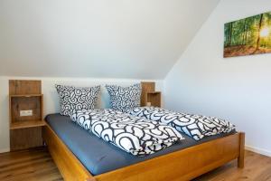 Una cama o camas en una habitación de Strandhaus Grömitz 2a