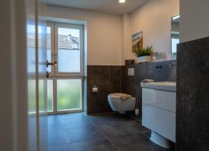 Un baño de Strandhaus Grömitz 2a 39 fotos más