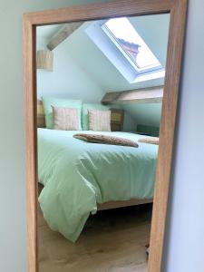 En eller flere senge i et værelse på Dijon city center Le Terracotta