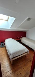 Ένα ή περισσότερα κρεβάτια σε δωμάτιο στο Le Duplex Bordeaux