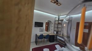 TV a/nebo společenská místnost v ubytování Pension Recidency