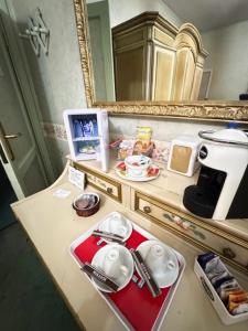 Kuchyň nebo kuchyňský kout v ubytování AmbraBed Lunghezza Station