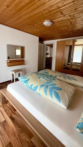 Postel nebo postele na pokoji v ubytování Haus Can