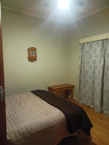 Ένα ή περισσότερα κρεβάτια σε δωμάτιο στο Mooi Uitsig Droom