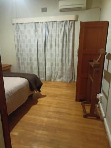 Ένα ή περισσότερα κρεβάτια σε δωμάτιο στο Mooi Uitsig Droom