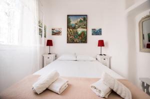 Letto o letti in una camera di Hotel Delfines