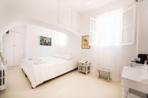Letto o letti in una camera di Hotel Delfines