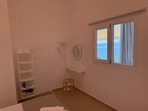 Amelia Seaview Apartments & Studios客房内的一张或多张床位