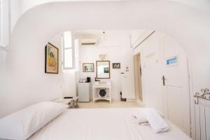 Letto o letti in una camera di Hotel Delfines
