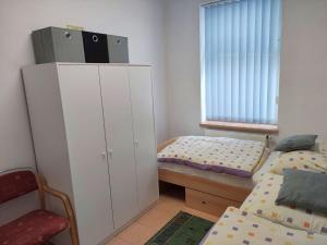 Posteľ alebo postele v izbe v ubytovaní Juvenis