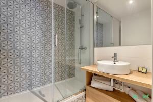 a bathroom with a sink and a shower at Louis Vicat 6 - CI - Ideal apartment for 4 Paris Expo Porte de Versailles in Paris