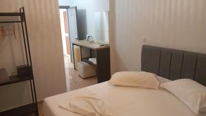 Postel nebo postele na pokoji v ubytování Areti Rooms Hotel