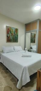 Giường trong phòng chung tại San Francisco Apart Hotel