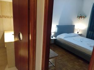 Postel nebo postele na pokoji v ubytování Villa Rodia 4 guests