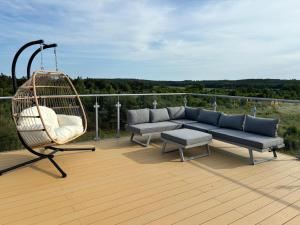 Balkón nebo terasa v ubytování Dębina Lounge z tarasem na dachu