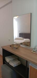 Postel nebo postele na pokoji v ubytování Areti Rooms Hotel