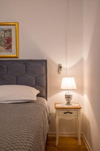 Ένα ή περισσότερα κρεβάτια σε δωμάτιο στο Guesthouse Rooms Split
