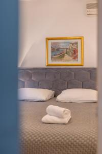 Ένα ή περισσότερα κρεβάτια σε δωμάτιο στο Guesthouse Rooms Split