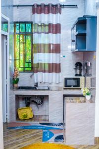 Kuchyň nebo kuchyňský kout v ubytování Green Villa