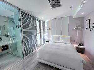 Postel nebo postele na pokoji v ubytování Hotel Mapp