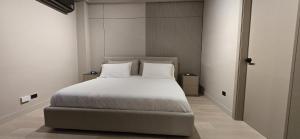 Ein Bett oder Betten in einem Zimmer der Unterkunft La Residence Panamá