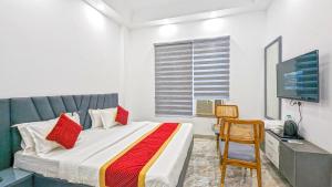 Postel nebo postele na pokoji v ubytování HOTEL GREEN VEGAS