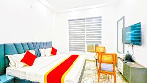 Postel nebo postele na pokoji v ubytování HOTEL GREEN VEGAS