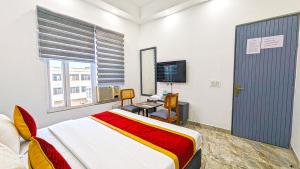 TV a/nebo společenská místnost v ubytování HOTEL GREEN VEGAS