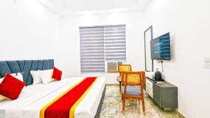 TV a/nebo společenská místnost v ubytování HOTEL GREEN VEGAS