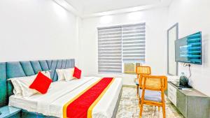 Postel nebo postele na pokoji v ubytování HOTEL GREEN VEGAS