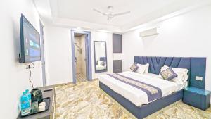 Postel nebo postele na pokoji v ubytování HOTEL GREEN VEGAS
