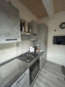 Kuchyň nebo kuchyňský kout v ubytování Il Paradiso Delle Farfalle + 11 fotografií