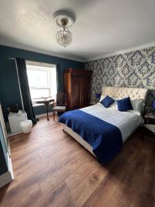 Postelja oz. postelje v sobi nastanitve Bray Head B&B