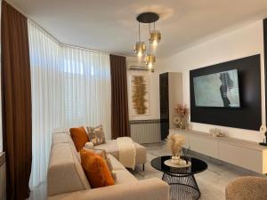 TV a/nebo společenská místnost v ubytování Apartment Meri
