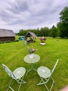 Zahrada ubytování Tagavälja talu Cottage and Sauna on a farm B&B, rural experience + 19 fotografií
