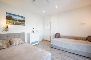 Postel nebo postele na pokoji v ubytování Wellness Villa Klínovec Views