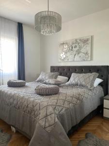 Postel nebo postele na pokoji v ubytování Apartment Meri