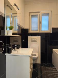 Koupelna v ubytování Apartment Meri