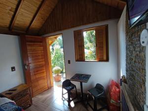 Posezení v ubytování Chalé Refúgio Jaguary + 28 fotografií