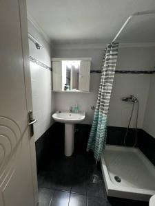 Koupelna v ubytování Apostolos House + 27 fotografií