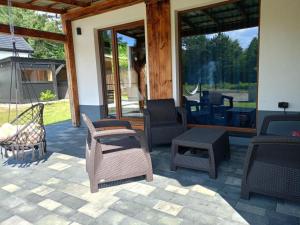 Posezení v ubytování Bania House Okuninka 1200 m do centrum