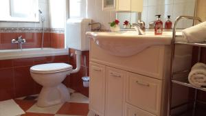 Ванная комната в Apartments & Room Marina View