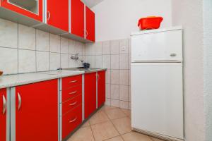 Kuchyň nebo kuchyňský kout v ubytování Apartments Jase